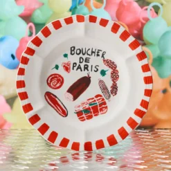 Assiette plate en faïence Boucher