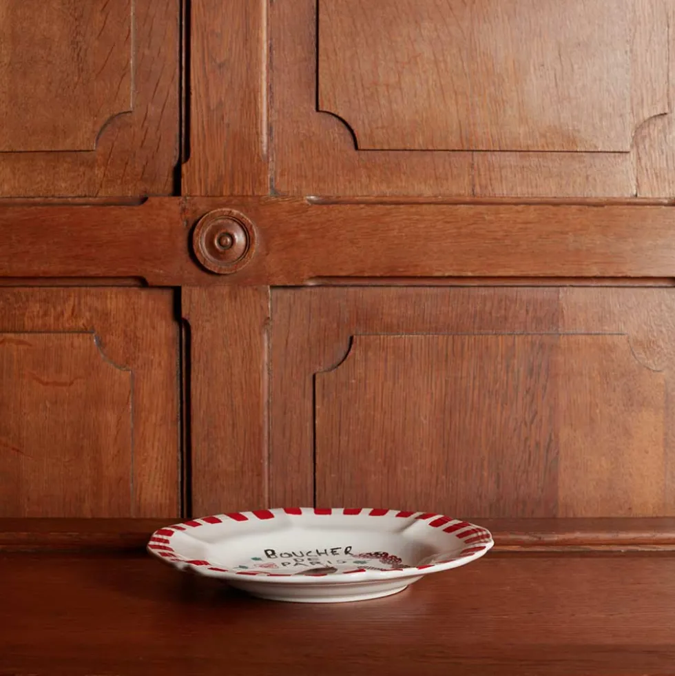 Assiette plate en faïence Boucher