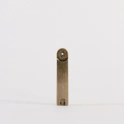Briquet à arc pivotant