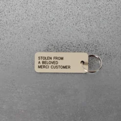 Merci x Various Keytags - Porte-clé "Stolen From a Beloved" - Beige