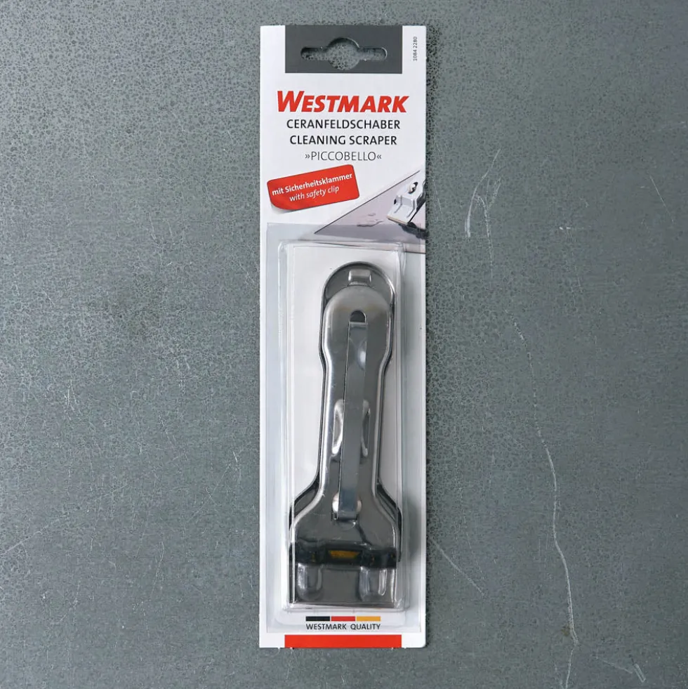Racleur pour plaques en vitrocéramique